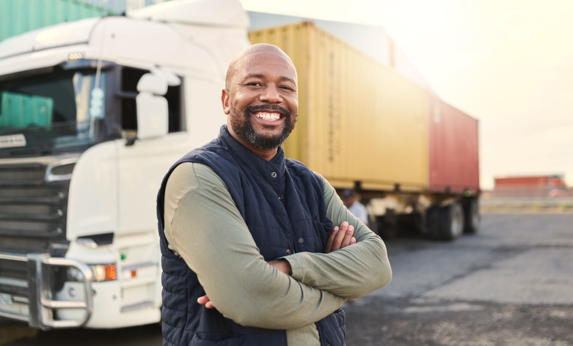 Proud driver beside his rig